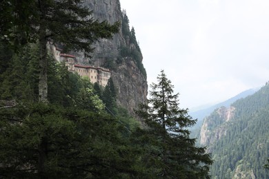 Photo of Picturesque view of old building in mountains