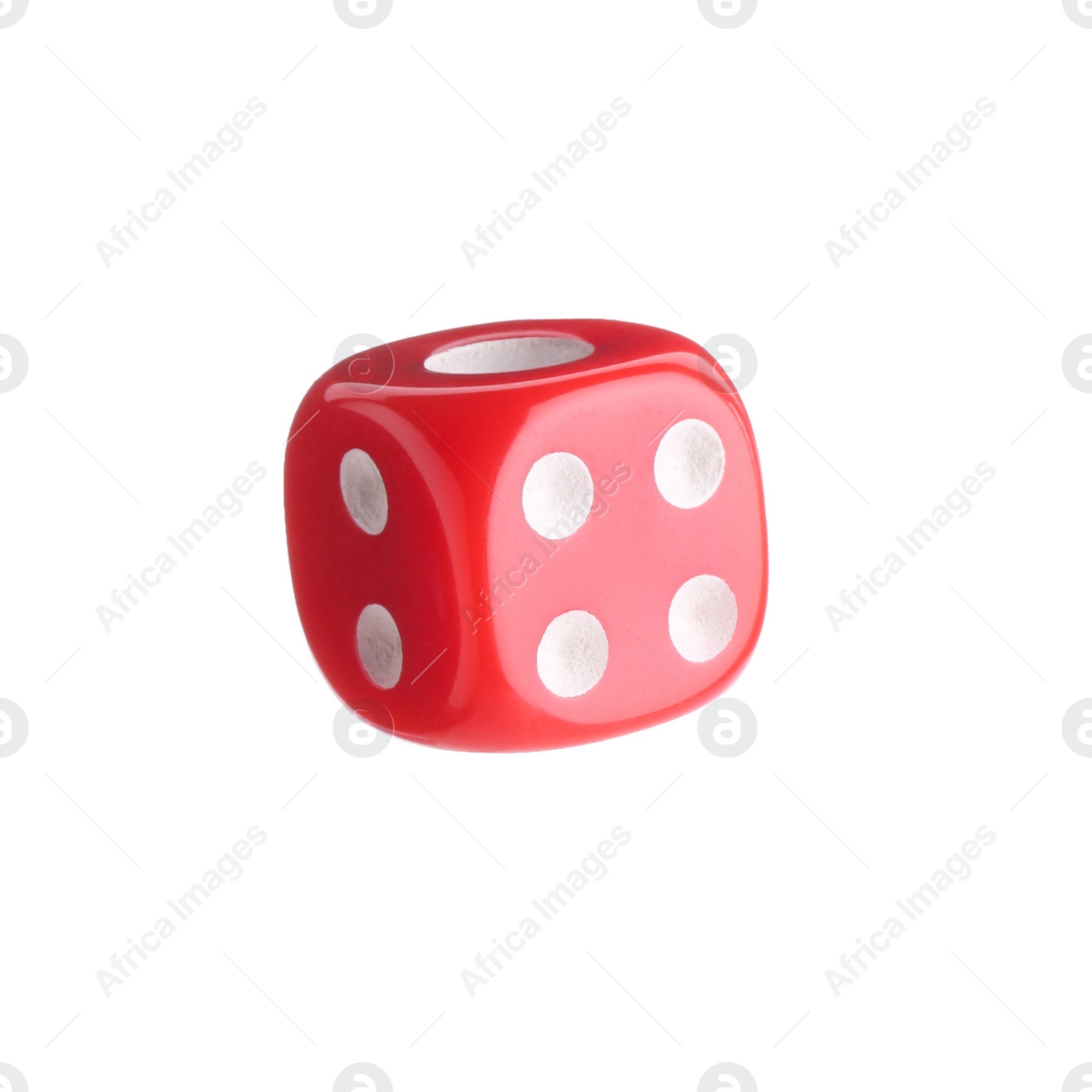 Photo of One red game dice isolated on white