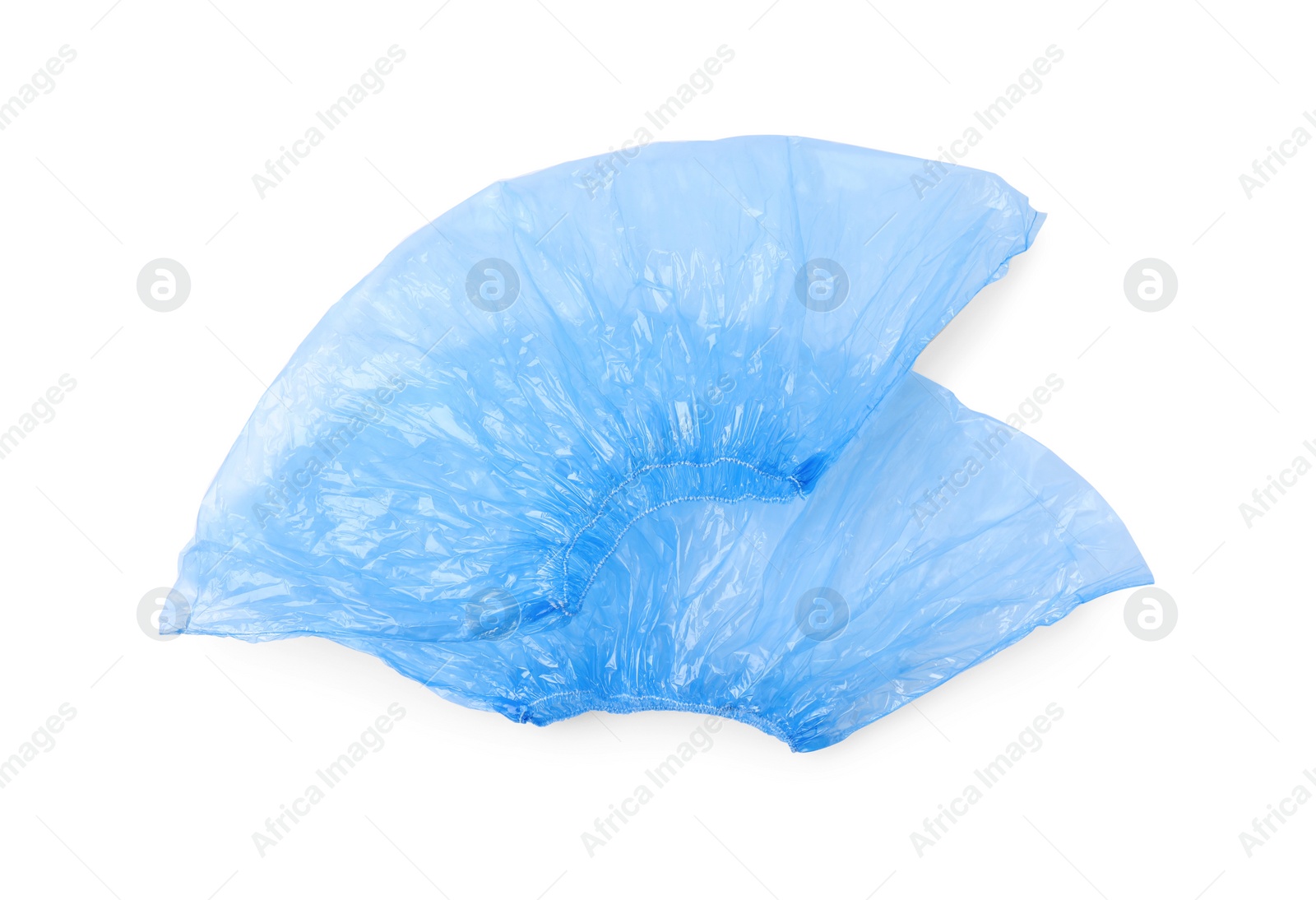 Photo of Pair of blue medical shoe covers isolated on white, top view