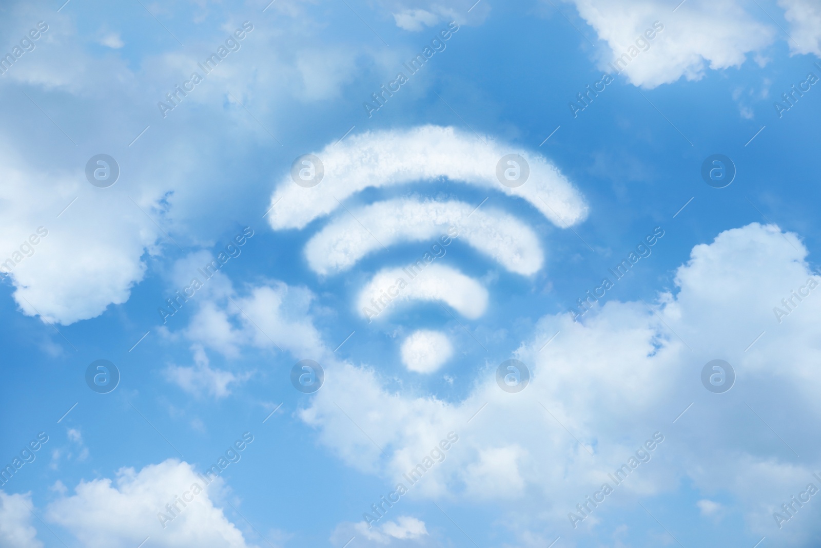 Image of Clouds in shape of WI-FI symbol against blue sky