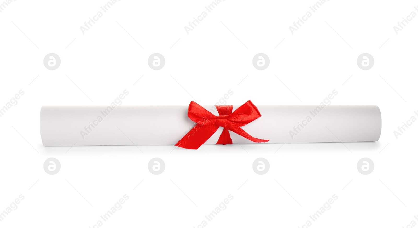 Photo of Rolled student's diploma with red ribbon isolated on white