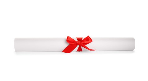 Photo of Rolled student's diploma with red ribbon isolated on white