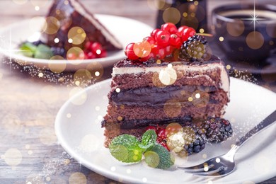 Delicious chocolate cake with berries on wooden table, closeup. Tasty dessert for Christmas dinner