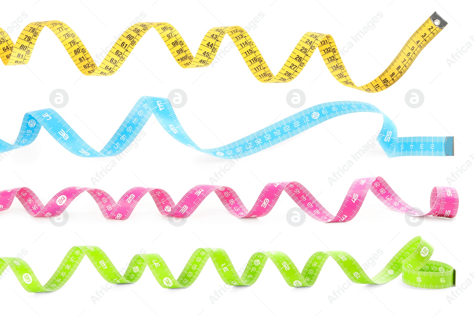 Image of Set with different measuring tapes on white background