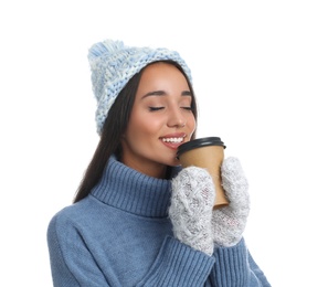 Photo of Happy beautiful woman with paper cup of mulled wine on white background