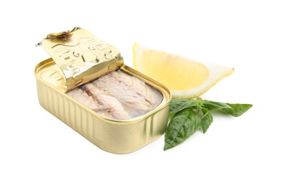 Photo of Open tin can with mackerel fillets, lemon and basil on white background