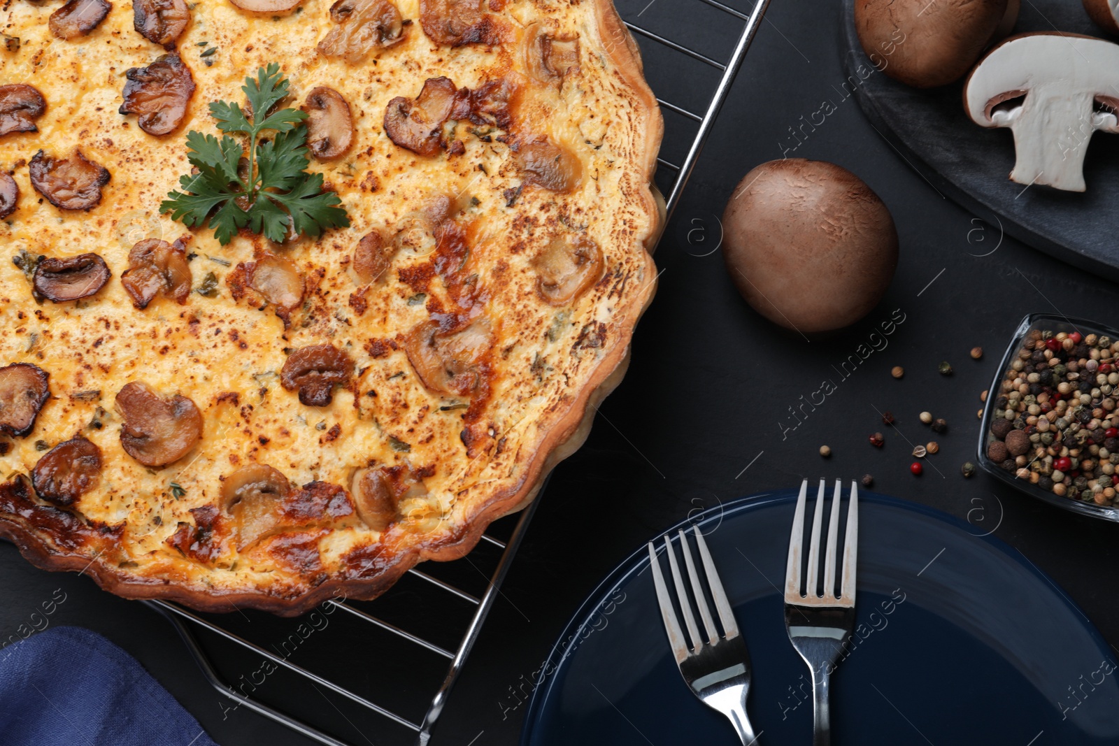 Photo of Flat lay composition with delicious homemade mushroom pie on black table