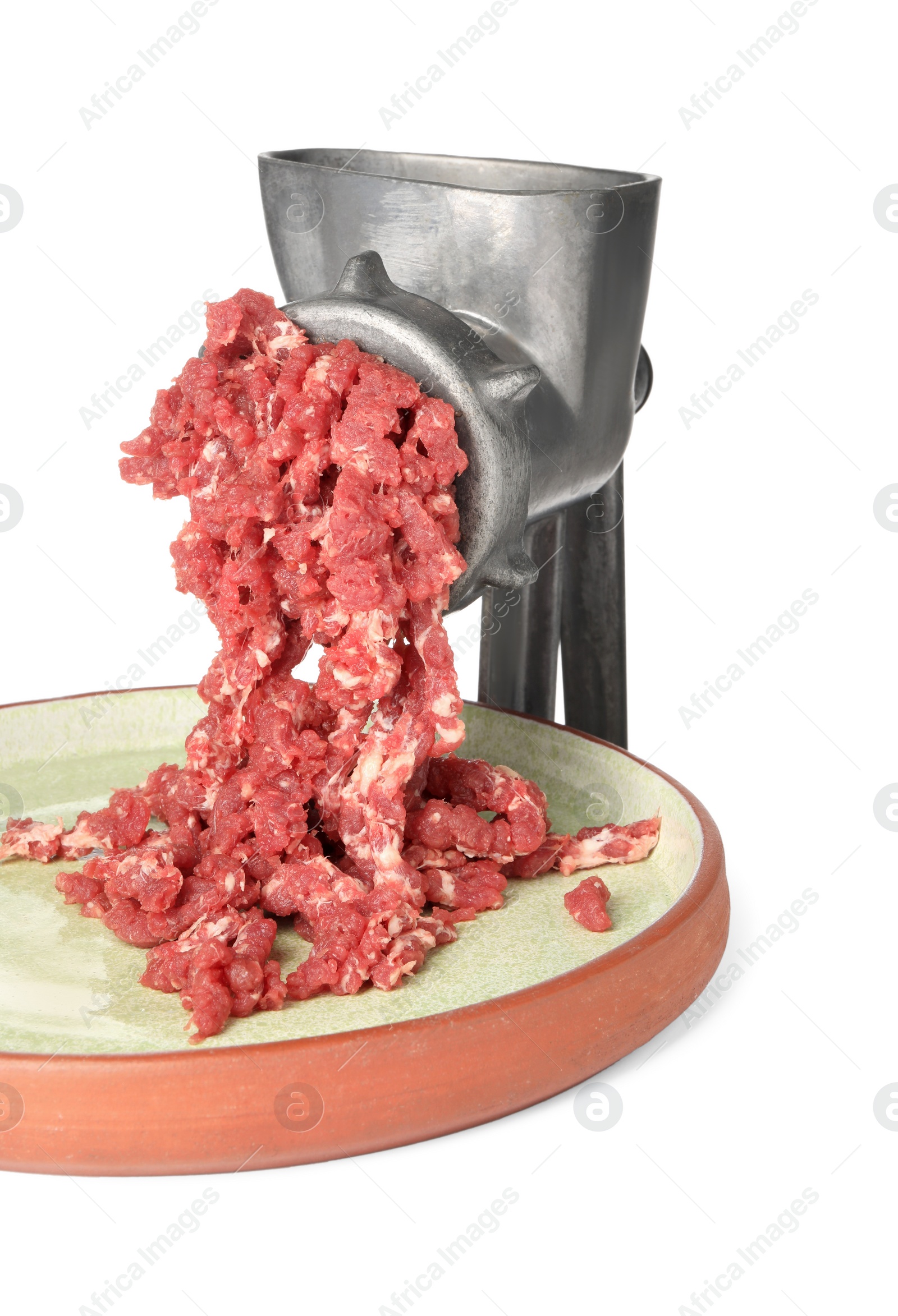 Photo of Metal meat grinder with minced beef and plate isolated on white