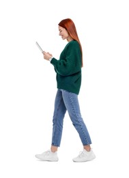 Happy woman using tablet on white background