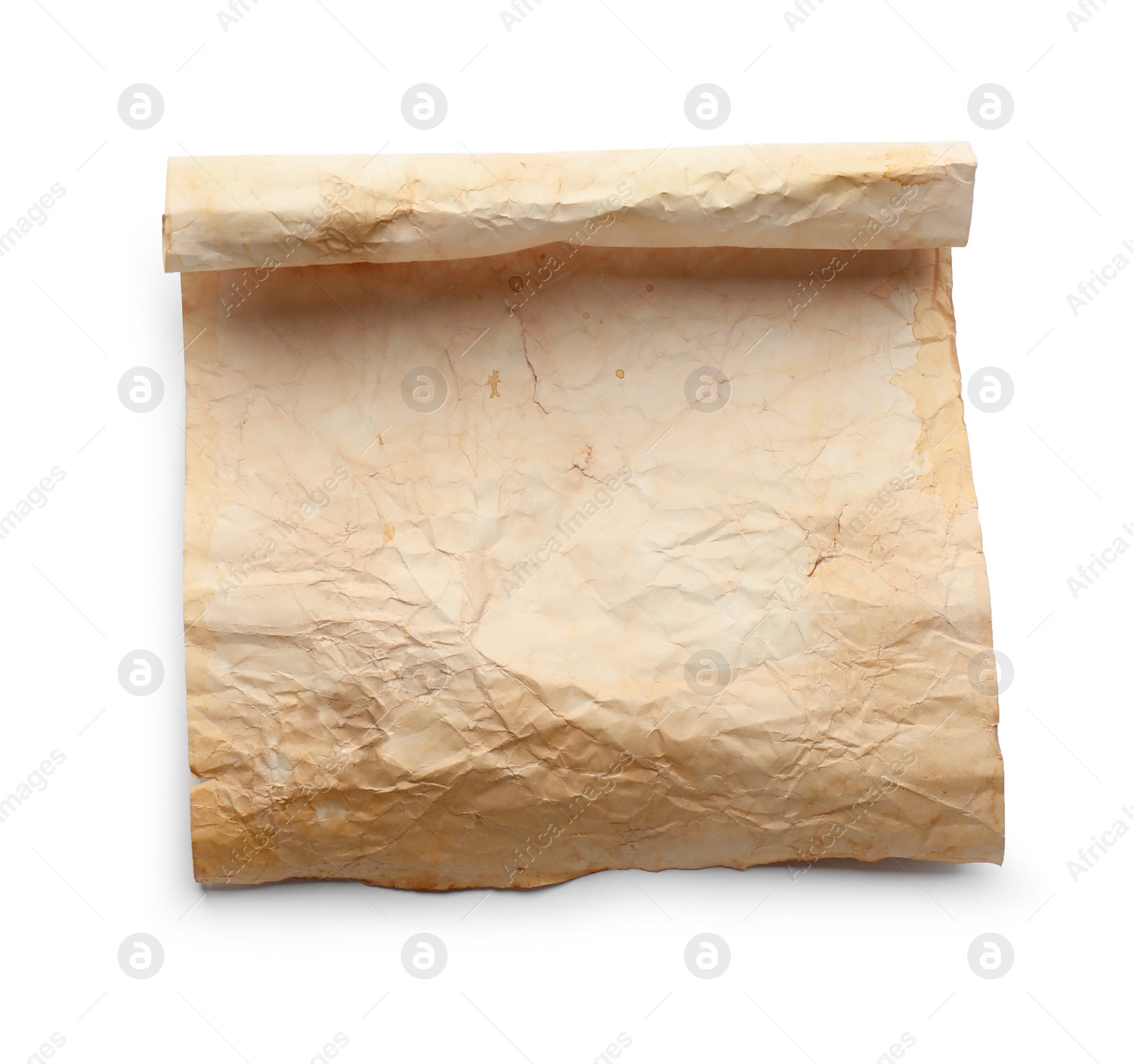 Photo of Sheet of old parchment paper isolated on white, top view. Space for design