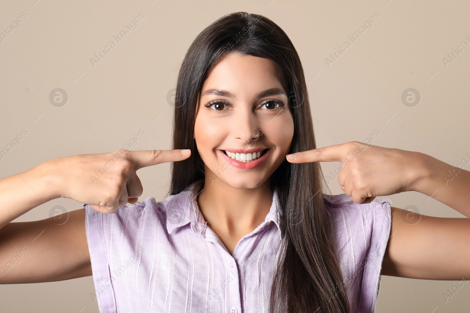 Photo of Young woman with healthy teeth on color background