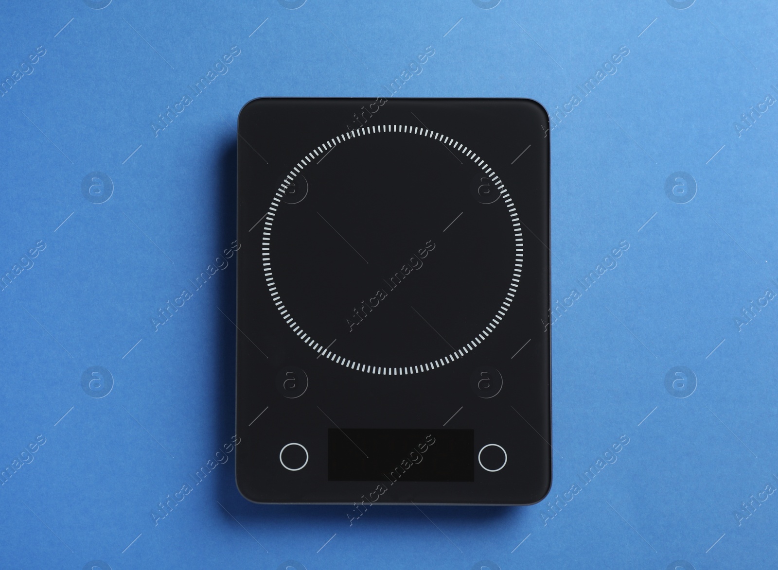 Photo of Modern digital kitchen scale on blue background, top view