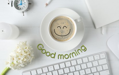 Flat lay composition with keyboard, coffee and flower on white wooden table. Good morning