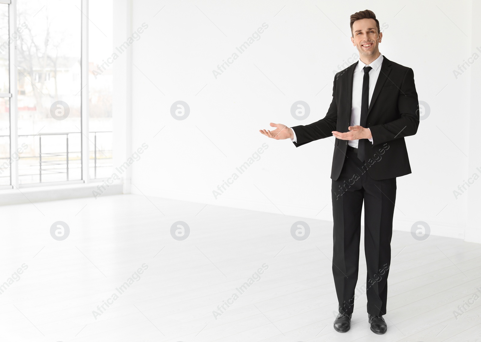 Photo of Male real estate agent indoors