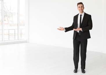 Photo of Male real estate agent indoors