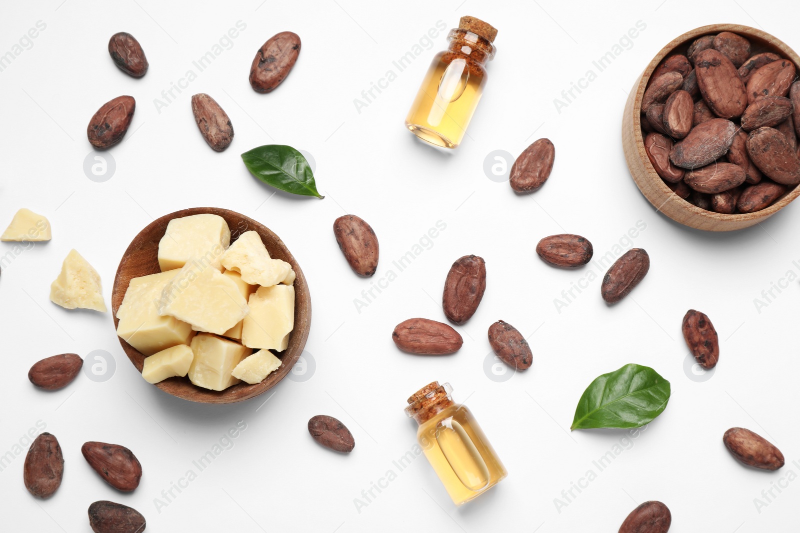 Photo of Composition with organic cocoa butter on white background, top view