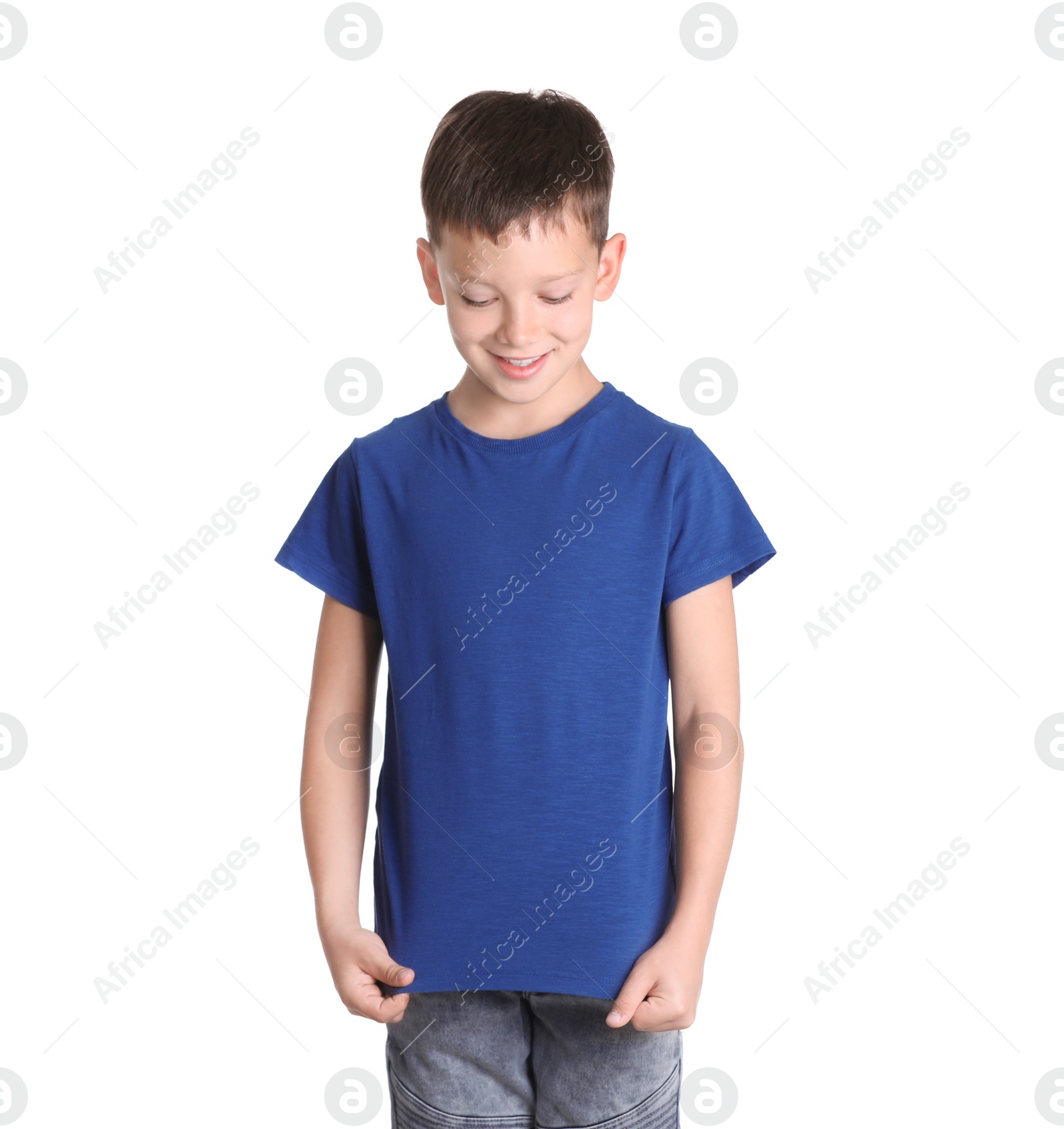 Photo of Little boy in t-shirt on white background. Mock-up for design