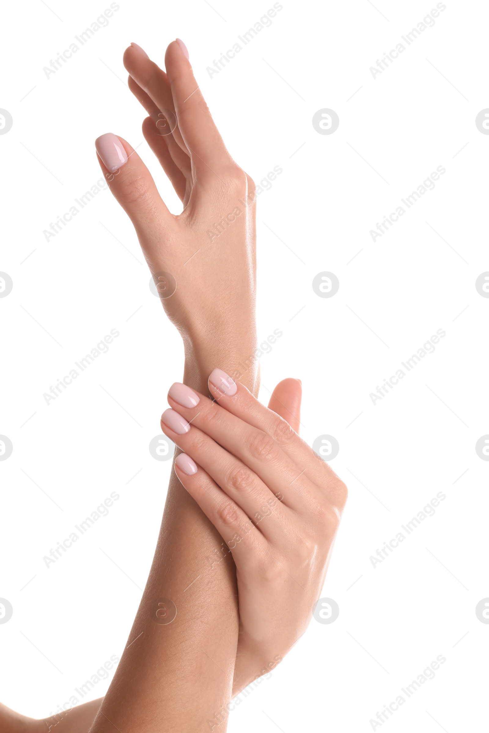 Photo of Woman with beautiful hands on white background, closeup. Spa treatment