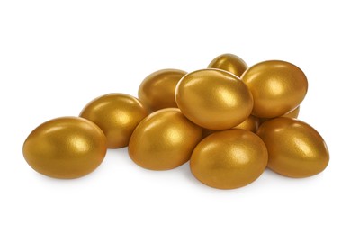 Many shiny golden eggs on white background