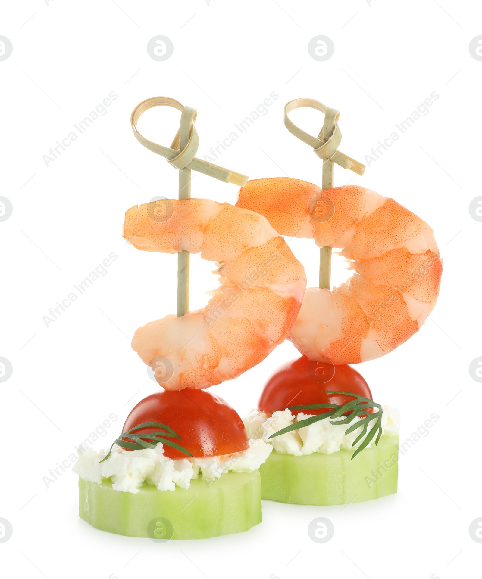 Photo of Tasty canapes with shrimps, vegetables and cream cheese isolated on white