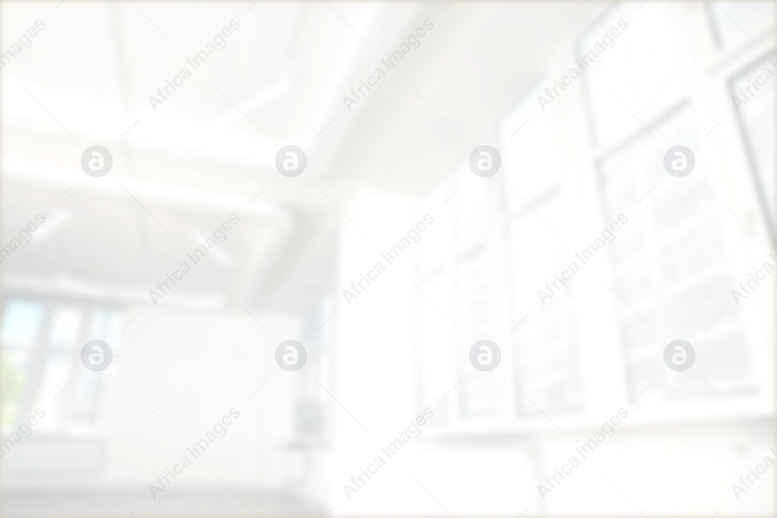 Image of Empty room with white ceiling and windows, blurred view