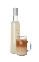 Photo of Mason jar with delicious iced coffee and coconut syrup on white background