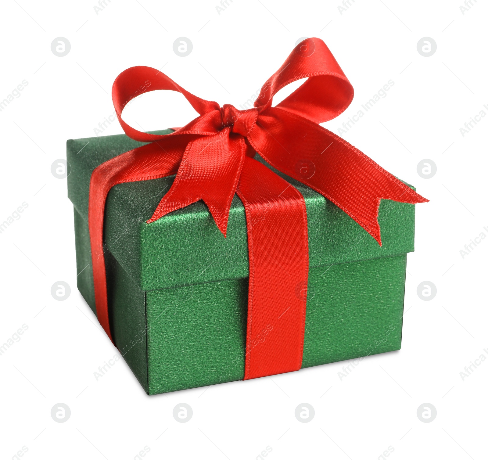 Photo of Christmas gift. Box with red ribbon bow on white background