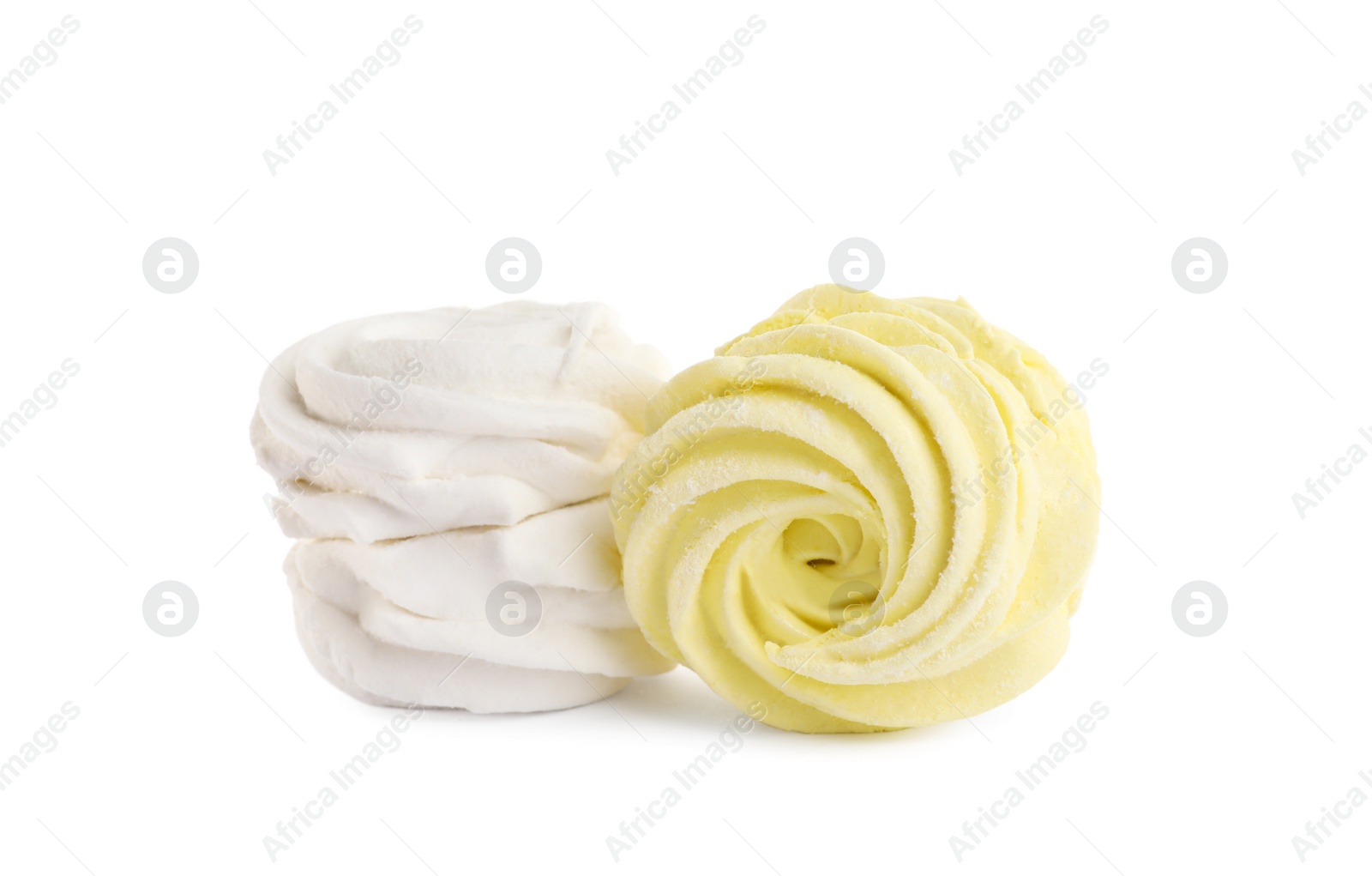 Photo of Two different delicious zephyrs on white background