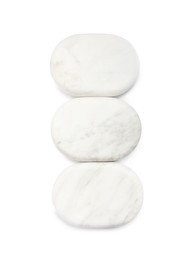 Group of marble stones on white background, top view