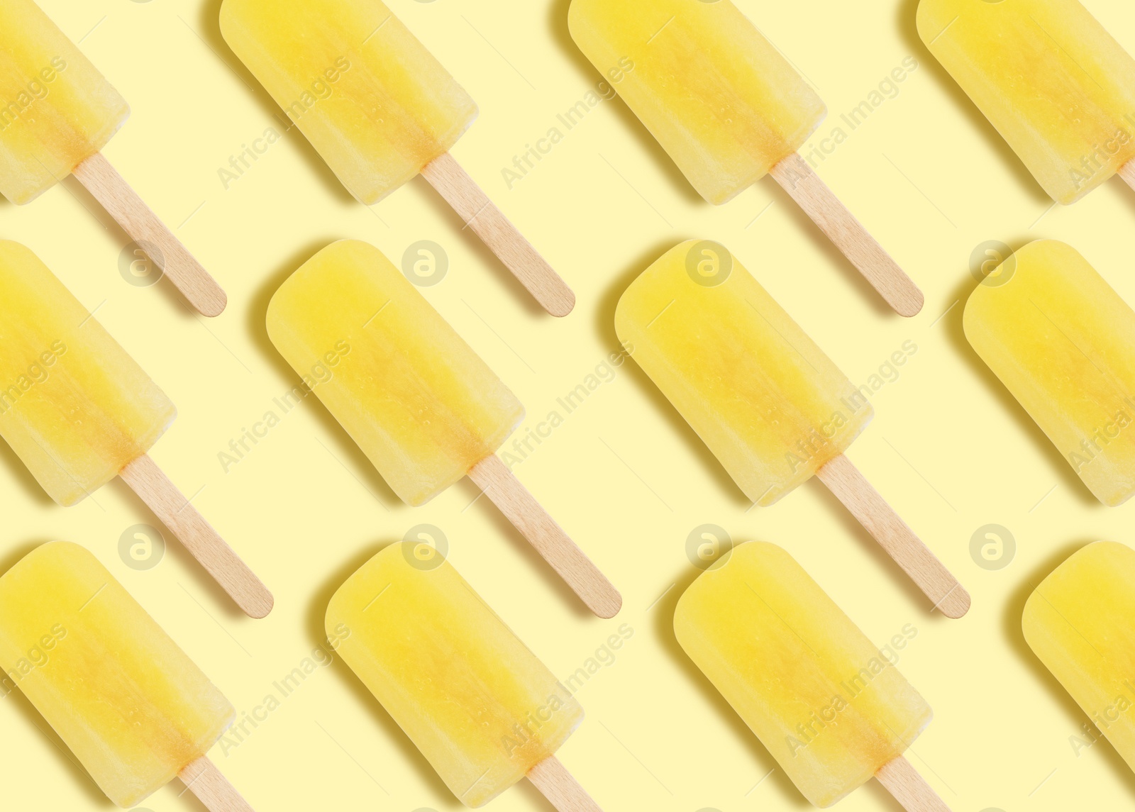 Image of Pattern with ice cream on pastel yellow background