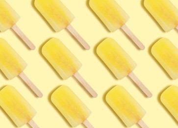 Pattern with ice cream on pastel yellow background