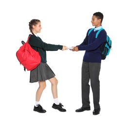 Teenagers in stylish school uniform on white background