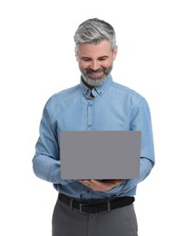 Mature businessman in stylish clothes with laptop on white background