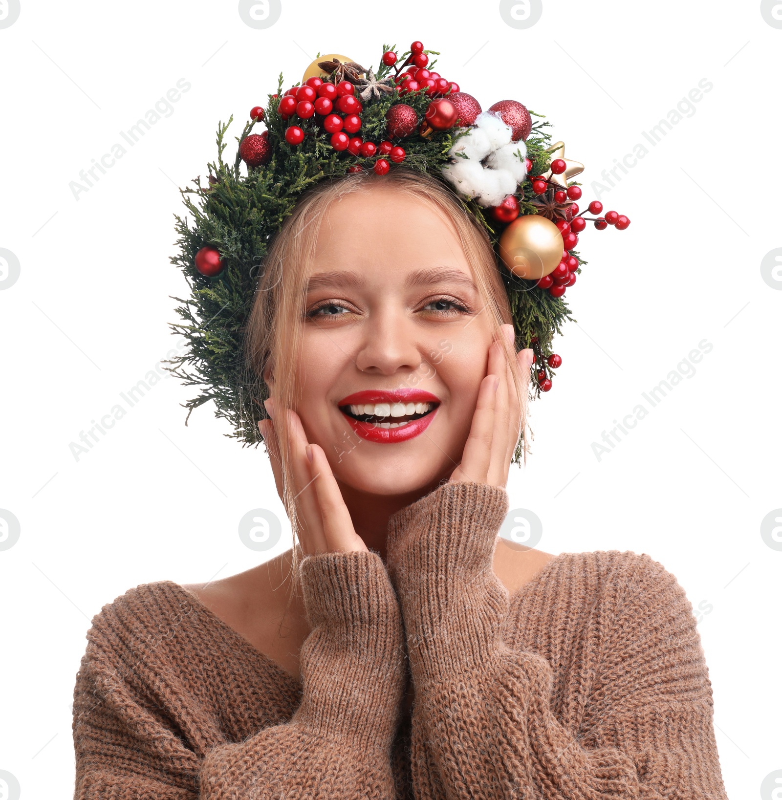 Photo of Beautiful young woman wearing Christmas wreath on white background