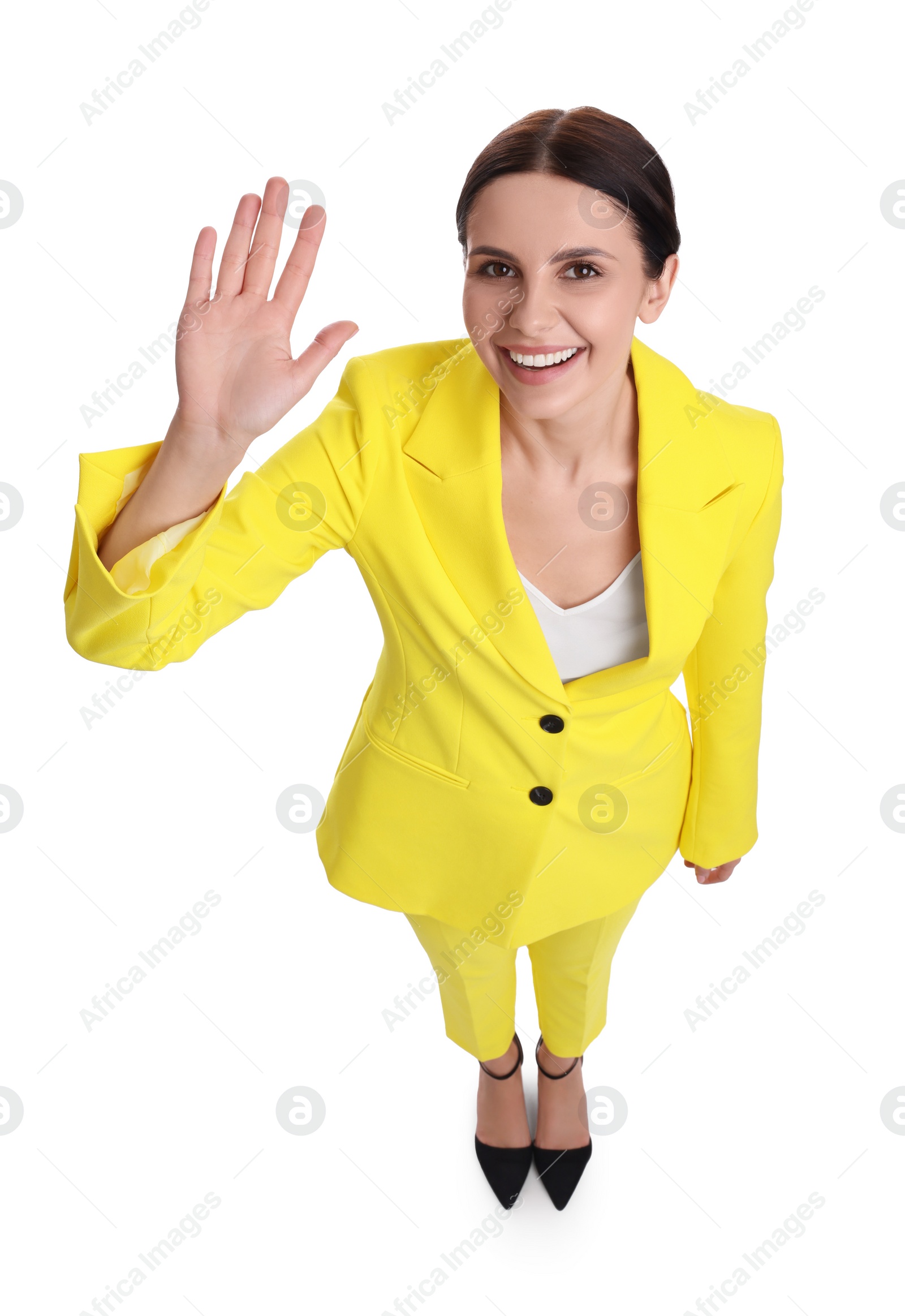 Photo of Beautiful businesswoman in yellow suit on white background, above view