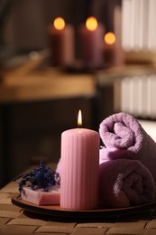 Beautiful composition with different spa products on wicker bench indoors