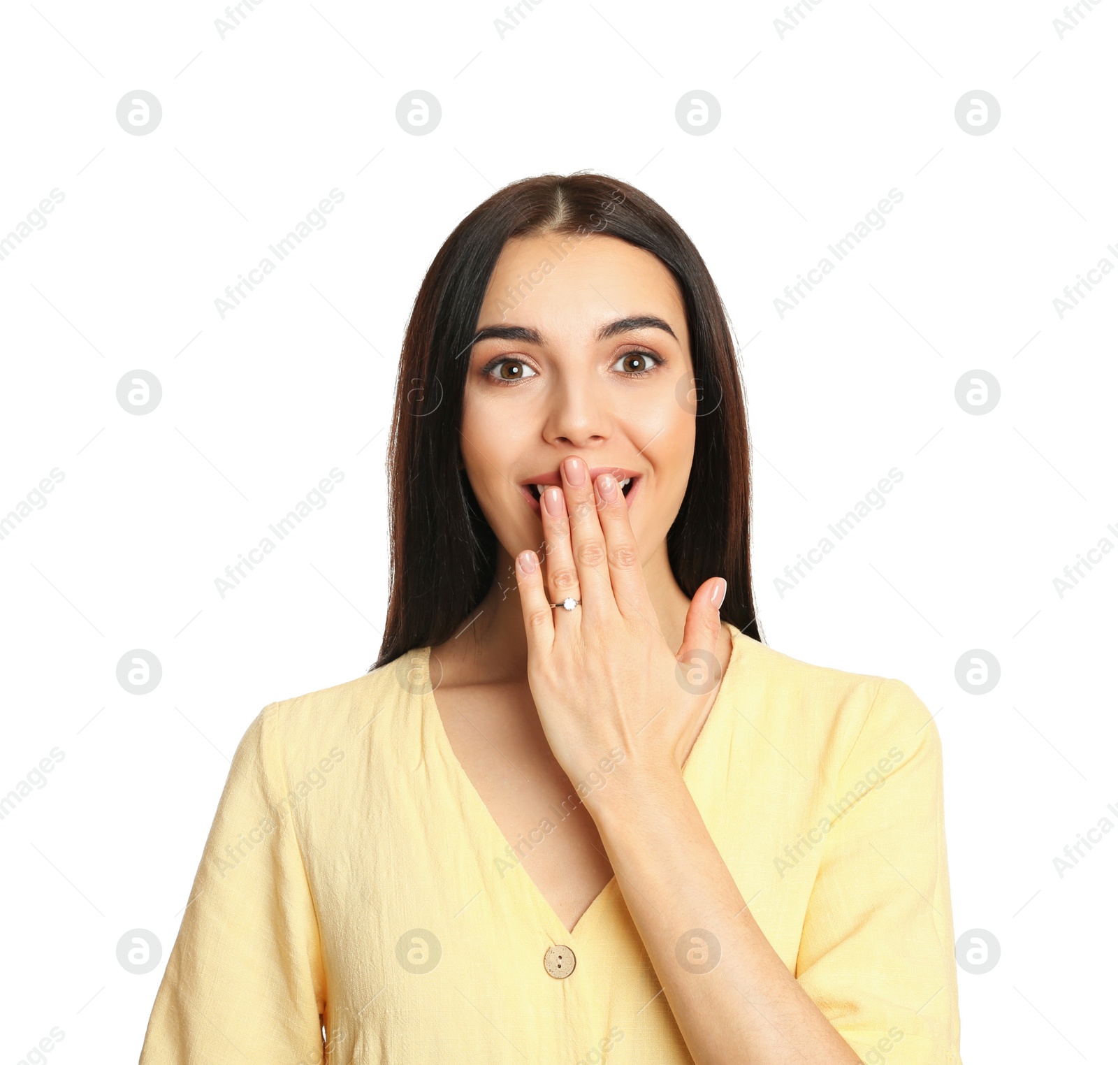 Photo of Emotional young woman wearing beautiful engagement ring on white background