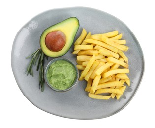Photo of Plate with delicious french fries and avocado dip isolated on white, top view