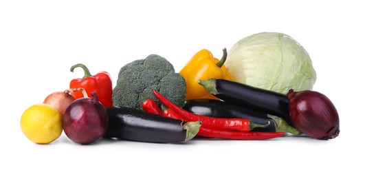 Heap of fresh ripe vegetables and fruit on white background