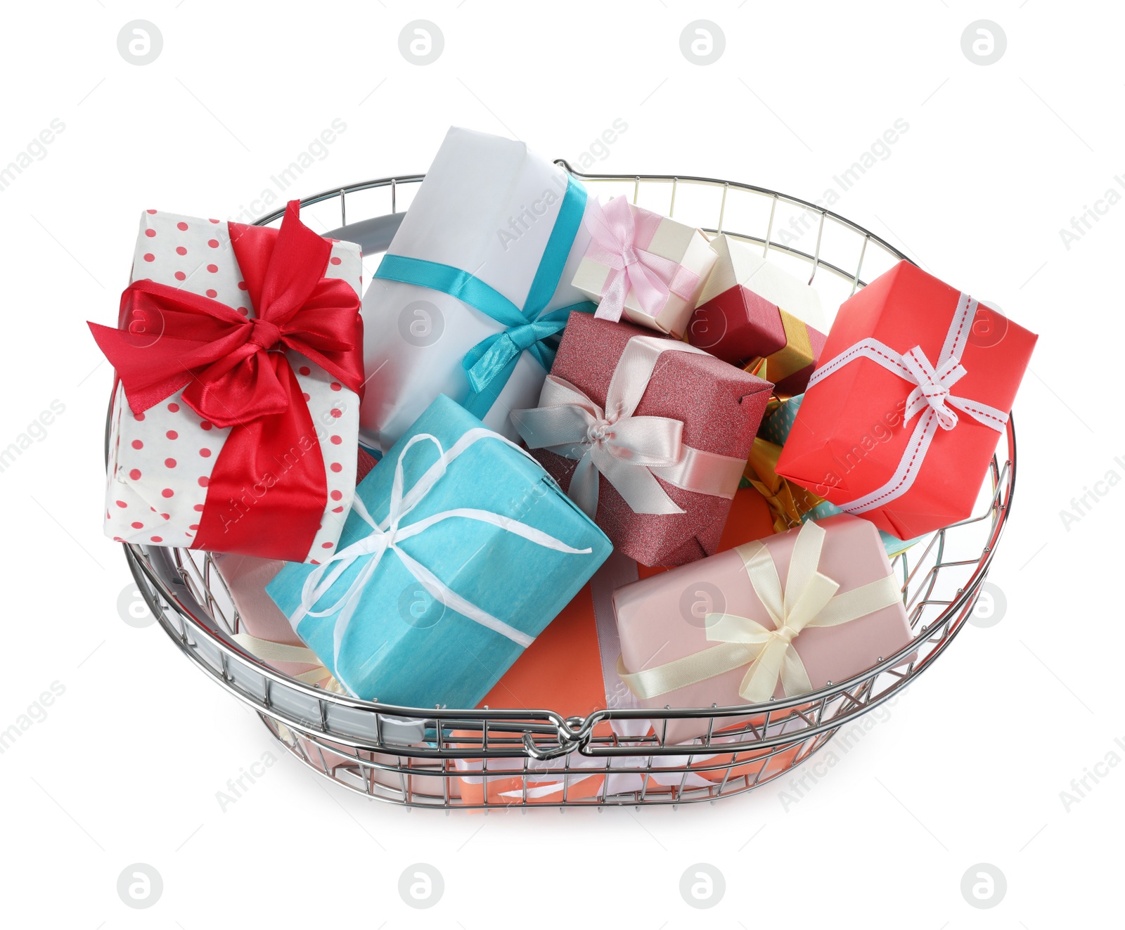 Photo of Shopping basket full of gift boxes on white background