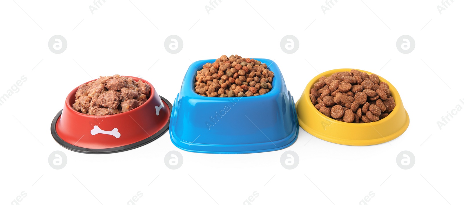 Photo of Dry and wet pet food in feeding bowls on white background