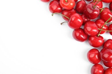 Photo of Heap of ripe sweet cherries on white background, top view