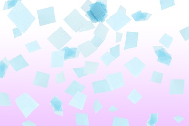 Image of Bright confetti falling on gradient violet background