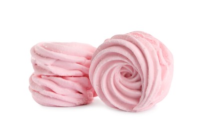 Photo of Two delicious pink zephyrs on white background