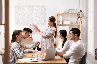 Team of professional journalists working in office