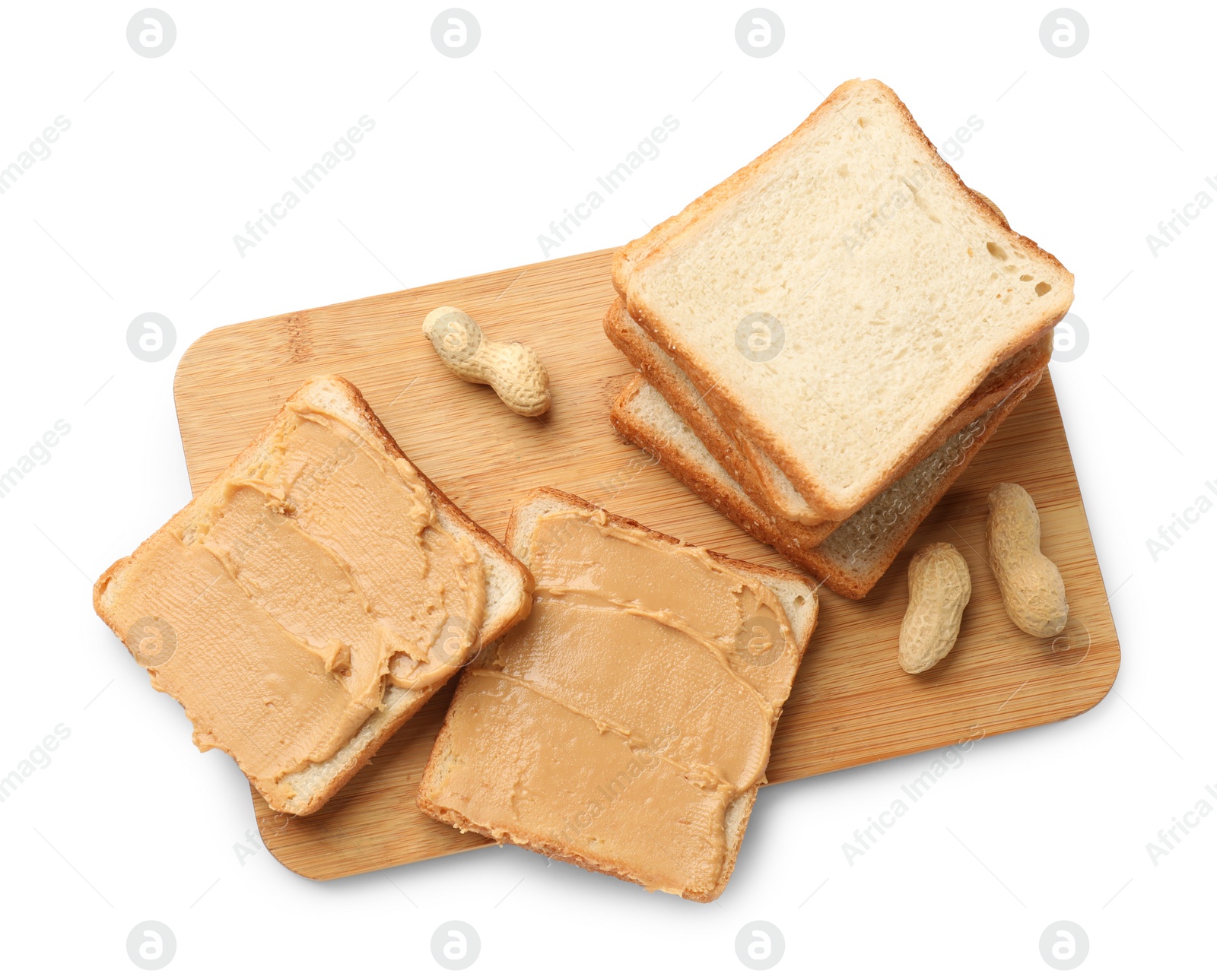 Photo of Tasty peanut butter sandwiches and peanuts on white background, top view