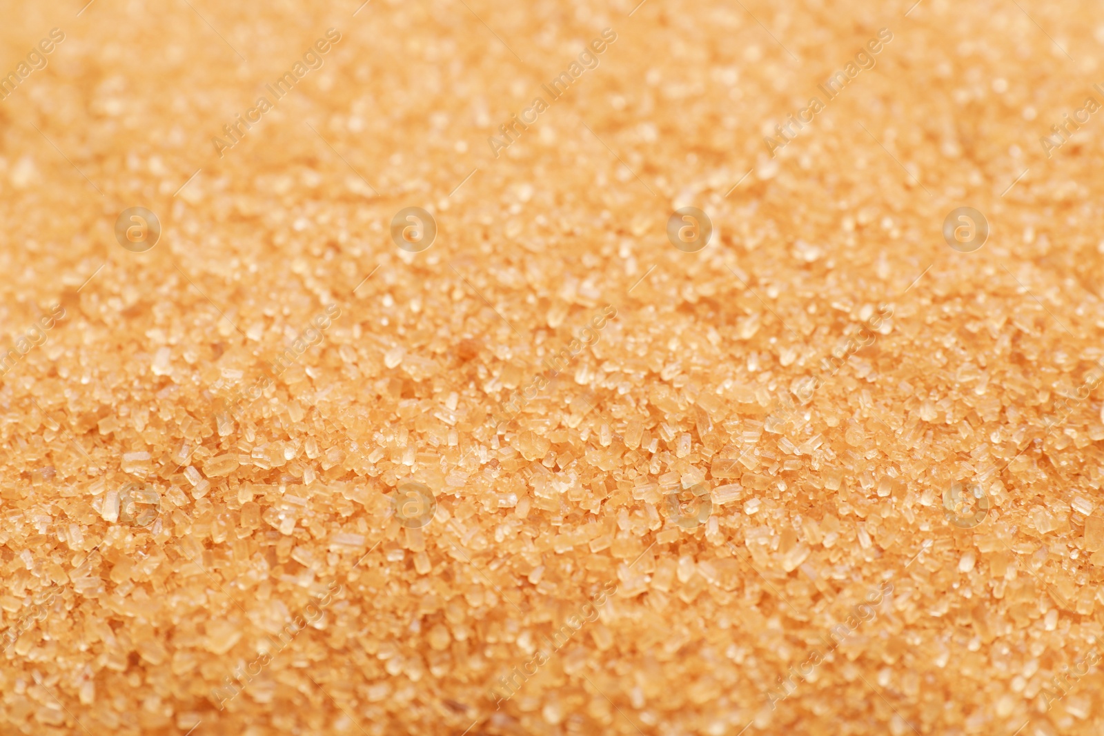 Photo of Pile of brown sugar as background, closeup