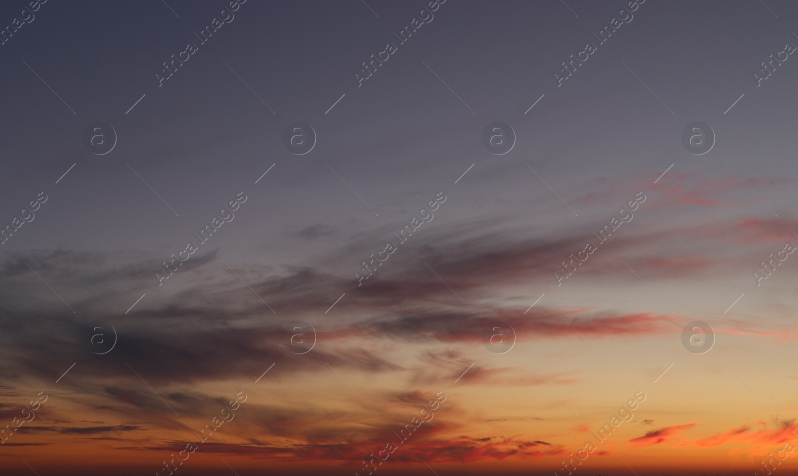 Photo of Picturesque view of beautiful sunset sky with clouds