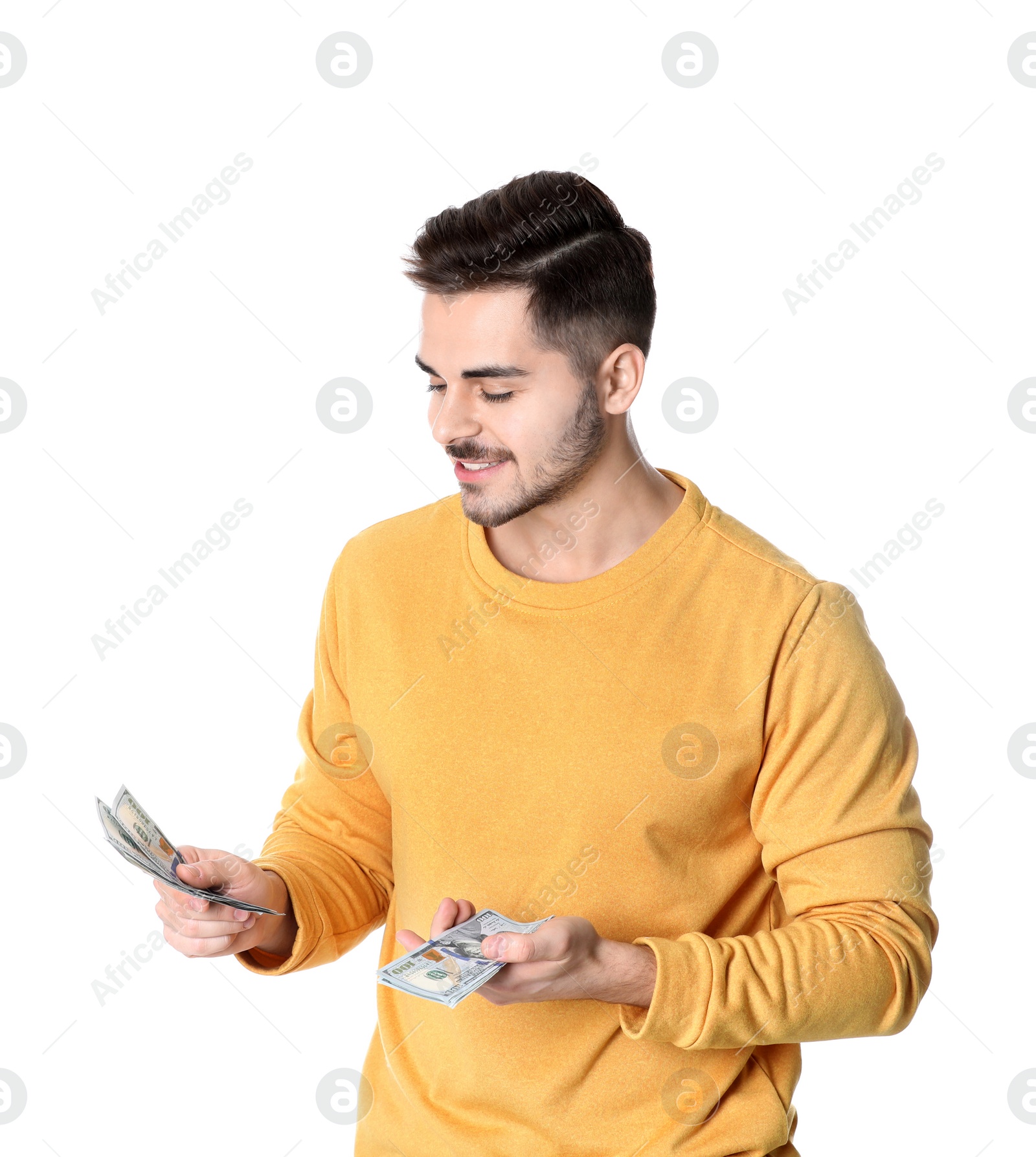 Photo of Happy young man with money on white background