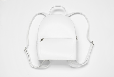 Photo of Stylish urban backpack on white background, top view